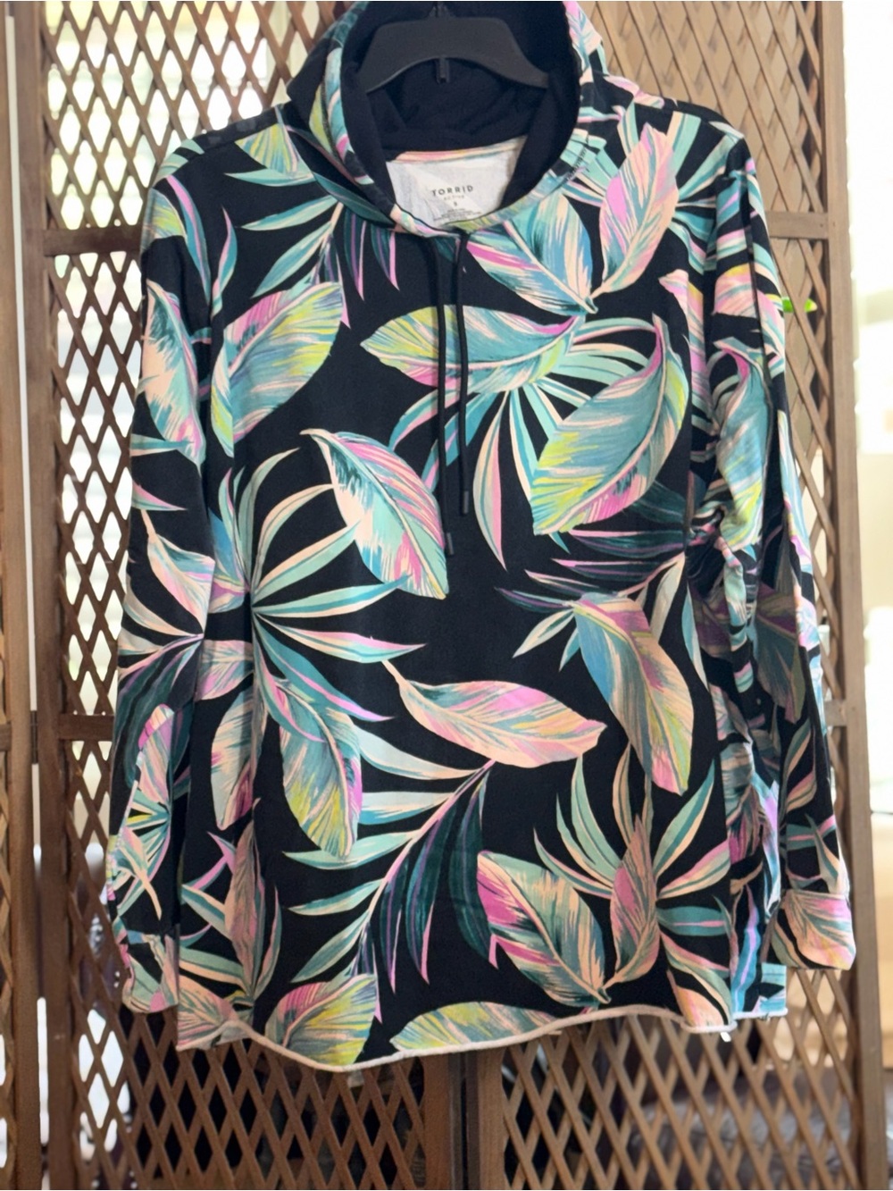 Torrid Pullover Black Hoodie with Pastel Tropical Leaf Print - Picture 3 of 6